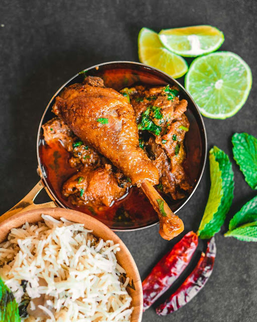 Hyderabadi style mutton biryani with layered rice and spiced meat