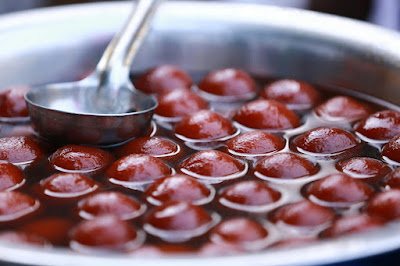 Soft gulab jamun balls soaked in fragrant sugar syrup, a classic Indian dessert
